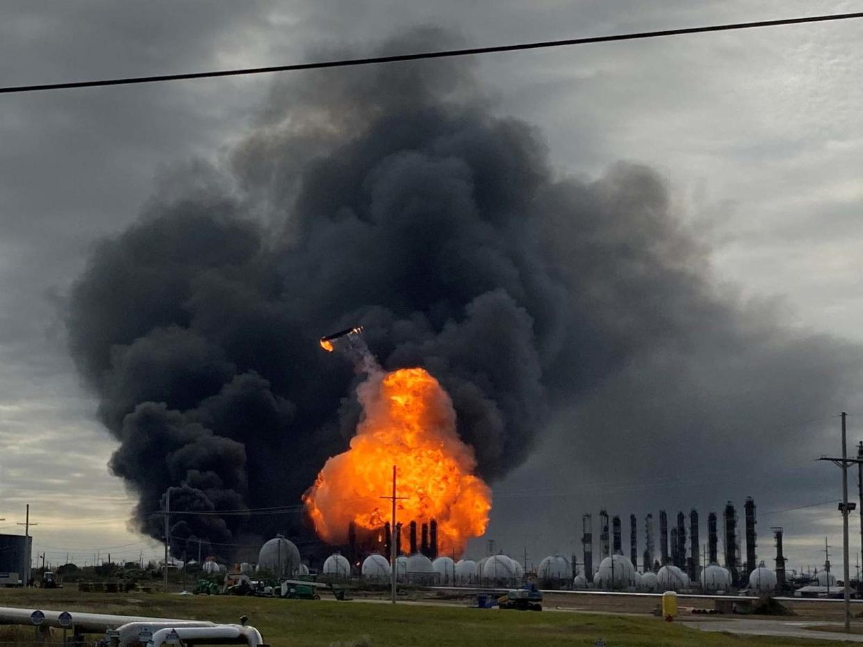 Flames are seen after a massive explosion that sparked a blaze at a Texas petrochemical plant: REUTERS