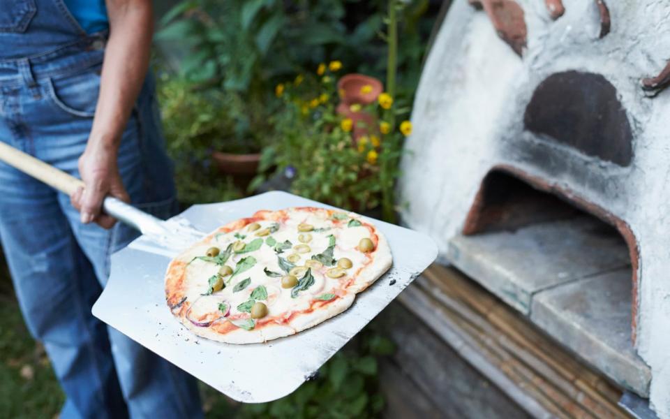 Garden pizza ovens have also been proving popular in recent weeks - Richard Drury/Getty Images