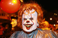 <p>A man dressed up as the killer clown Pennywise from the movie “It” participates in the 44th annual Village Halloween Parade in New York City on Oct. 31, 2017. (Photo: Gordon Donovan/Yahoo News) </p>