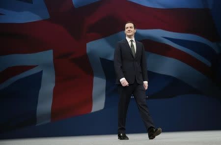 Britain's Chancellor of the Exchequer George Osborne arrives to deliver his keynote speech at the annual Conservative Party Conference in Manchester, Britain October 5, 2015. REUTERS/Suzanne Plunkett