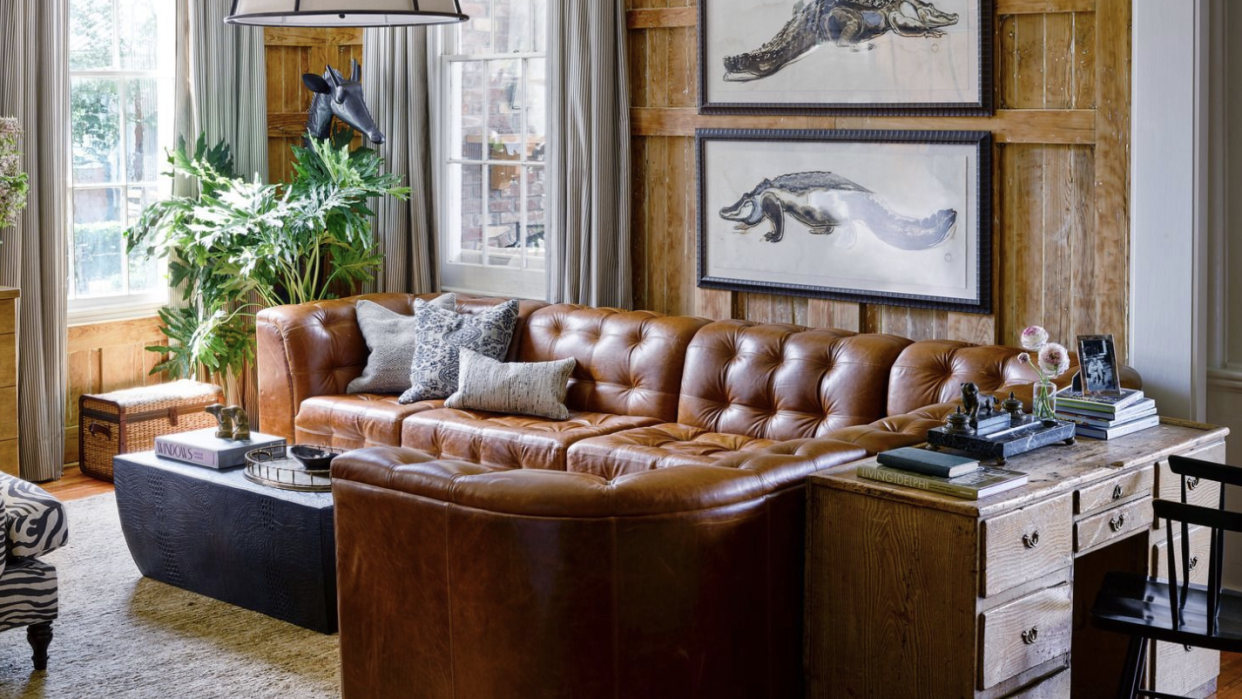 a living room with a couch and coffee table