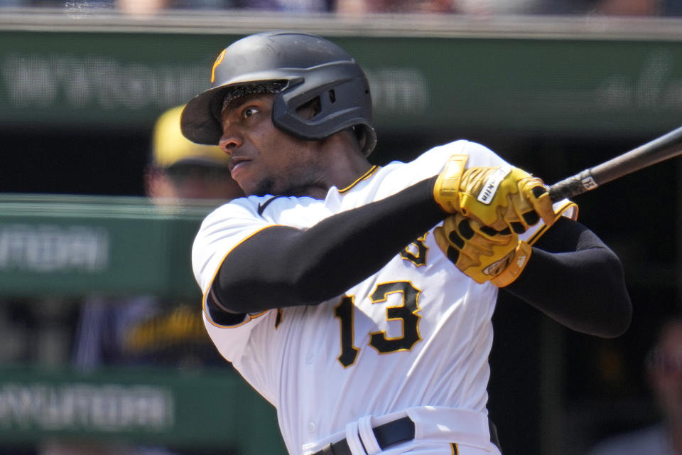 Pittsburgh Pirates' Ke'Bryan Hayes follows through on a solo home run off Milwaukee Brewers starting pitcher Freddy Peralta during the first inning of a baseball game in Pittsburgh, Wednesday, Sept. 6, 2023. (AP Photo/Gene J. Puskar)