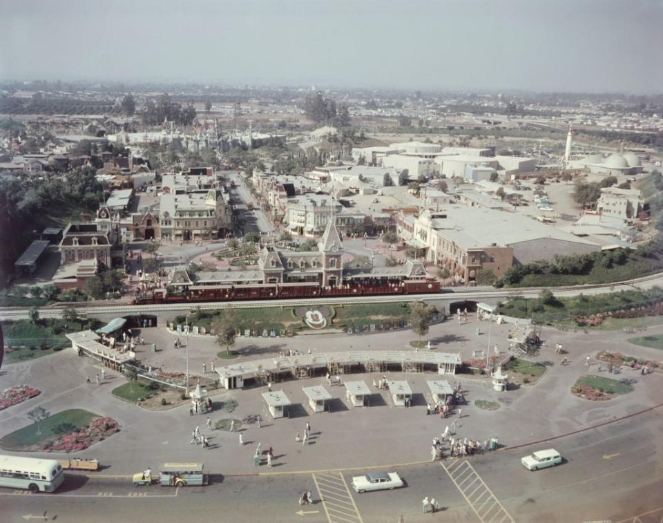 Aerial view of Disneyland circa 1950s, showcasing the park's entrance, Main Street USA, and various attractions in the background