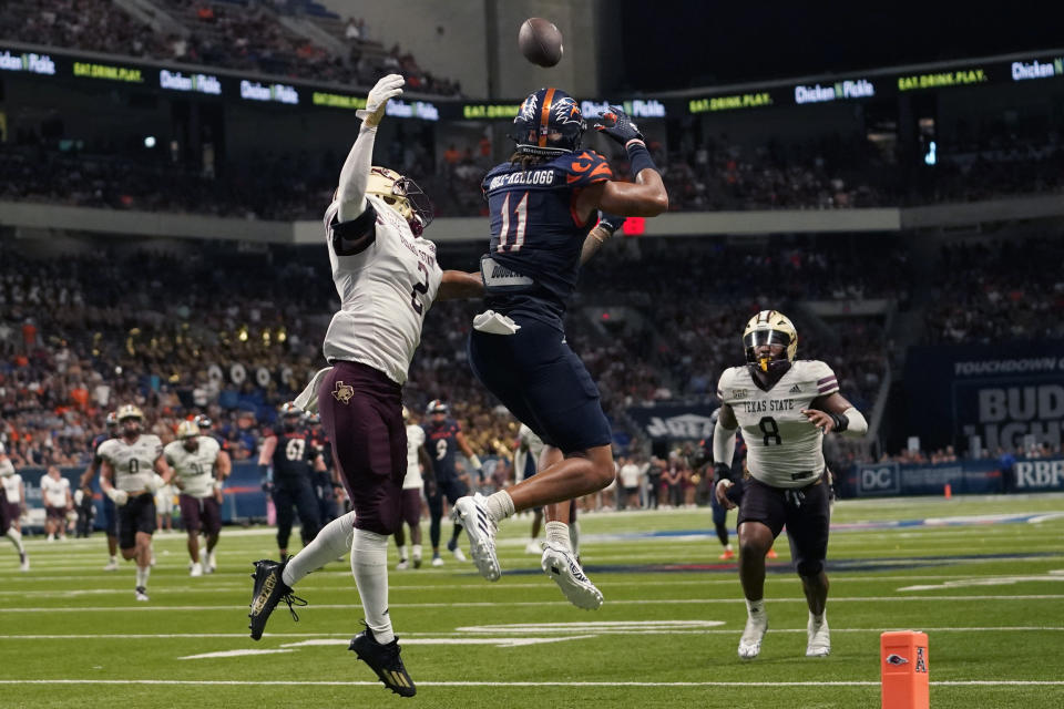 Texas State cornerback Kaleb Ford-Dement (2) breaks up a pass intended for UTSA wide receiver Tykee Ogle-Kellogg (11) during the second half of an NCAA college football game, Saturday, Sept. 9, 2023, in San Antonio. (AP Photo/Eric Gay)