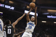 Orlando Magic guard Markelle Fultz (20) shoots over Sacramento Kings guard Malik Monk (0) in the first quarter in an NBA basketball game in Sacramento, Calif., Monday, Jan. 9, 2023. (AP Photo/José Luis Villegas)