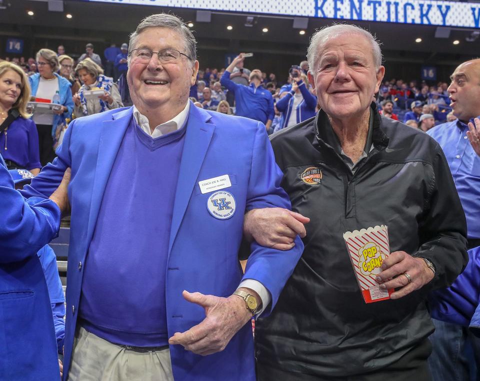 Kentucky Coach Joe B. Hall and Louisville coach Denny Crum pose for a photo at Rupp Arena before the game.December 28, 2019