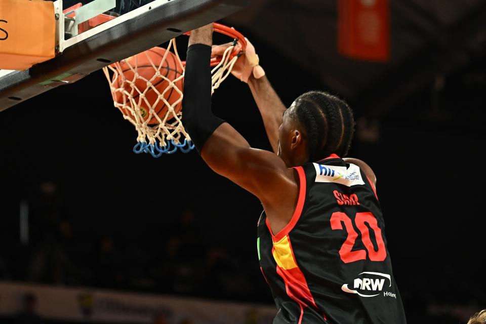 Perth Wildcats' Alexandre Sarr dunks during an NBL match vs. the Cairns Taipans on Dec. 26, 2023, in Cairns, Australia.