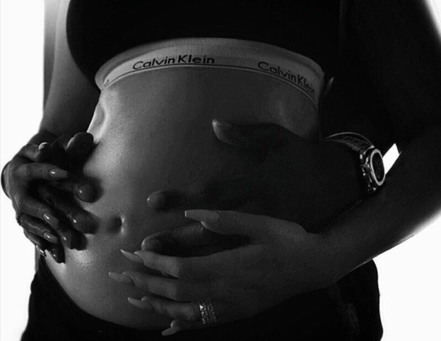 Khloé Kardashian announces pregnancy wearing Calvin Klein bra: #Ad?