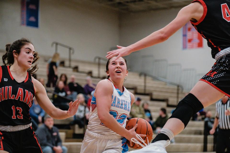 Rylee Putt, with ball, of Garaway.