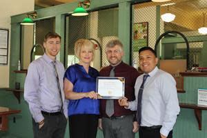 Unity Bank’s Flemington Branch team with Unity’s Best Bank 2023 Hunterdon Happening award. Pictured (from left) are Stephen Lowndes, Kathleen DeFilippis, David Scannell, and Luis Moposita.