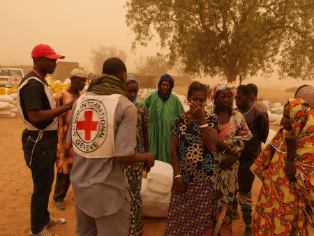 Villagers are seen following the March 23 attack by militiamen that killed about 160 Fulani people, in Ogossagou Village, Mali, March 31, 2019 in this handout picture obtained April 18, 2019. ICRC via REUTERS