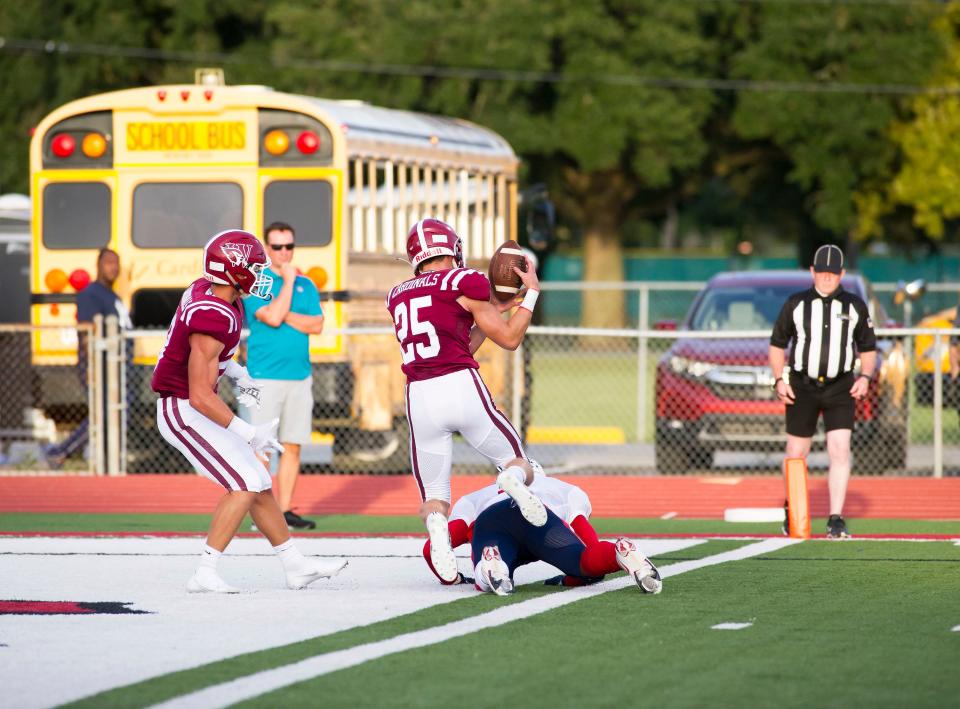 E.D. White defensive back Ethan Lee (25) gets an interception during a scrimmage against Liberty in Thibodaux on Aug. 20.