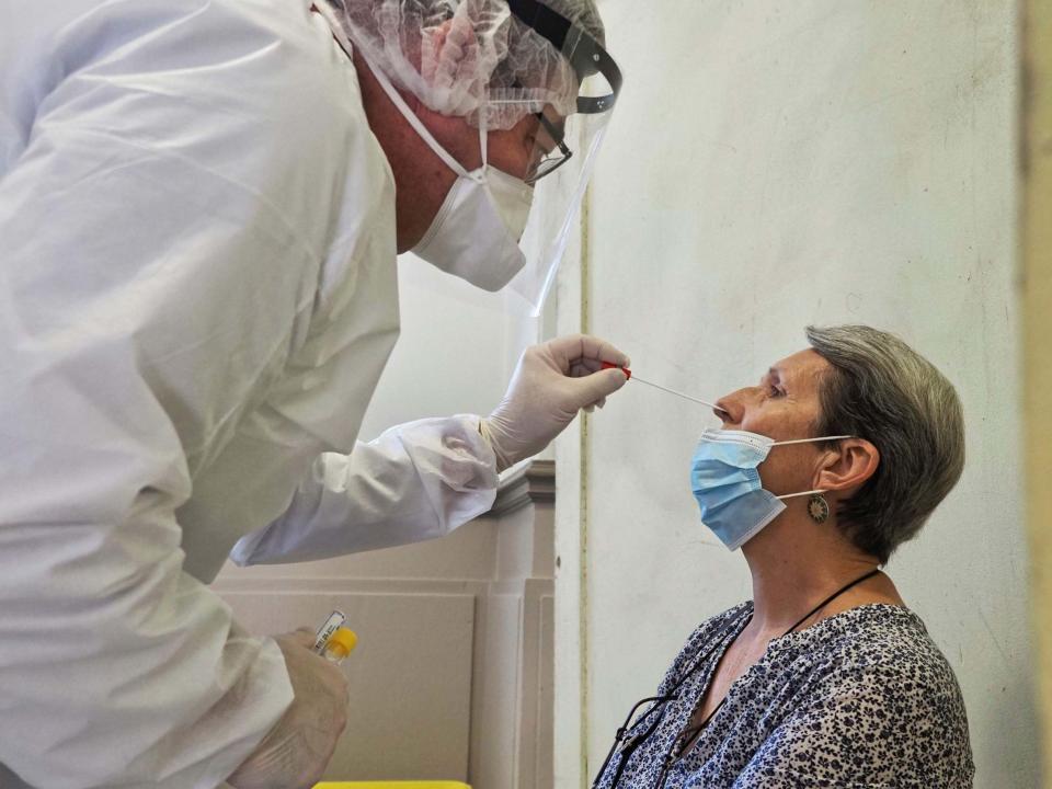 A person undergoes a Covid-19 test on 7 July 2020: AFP/Getty