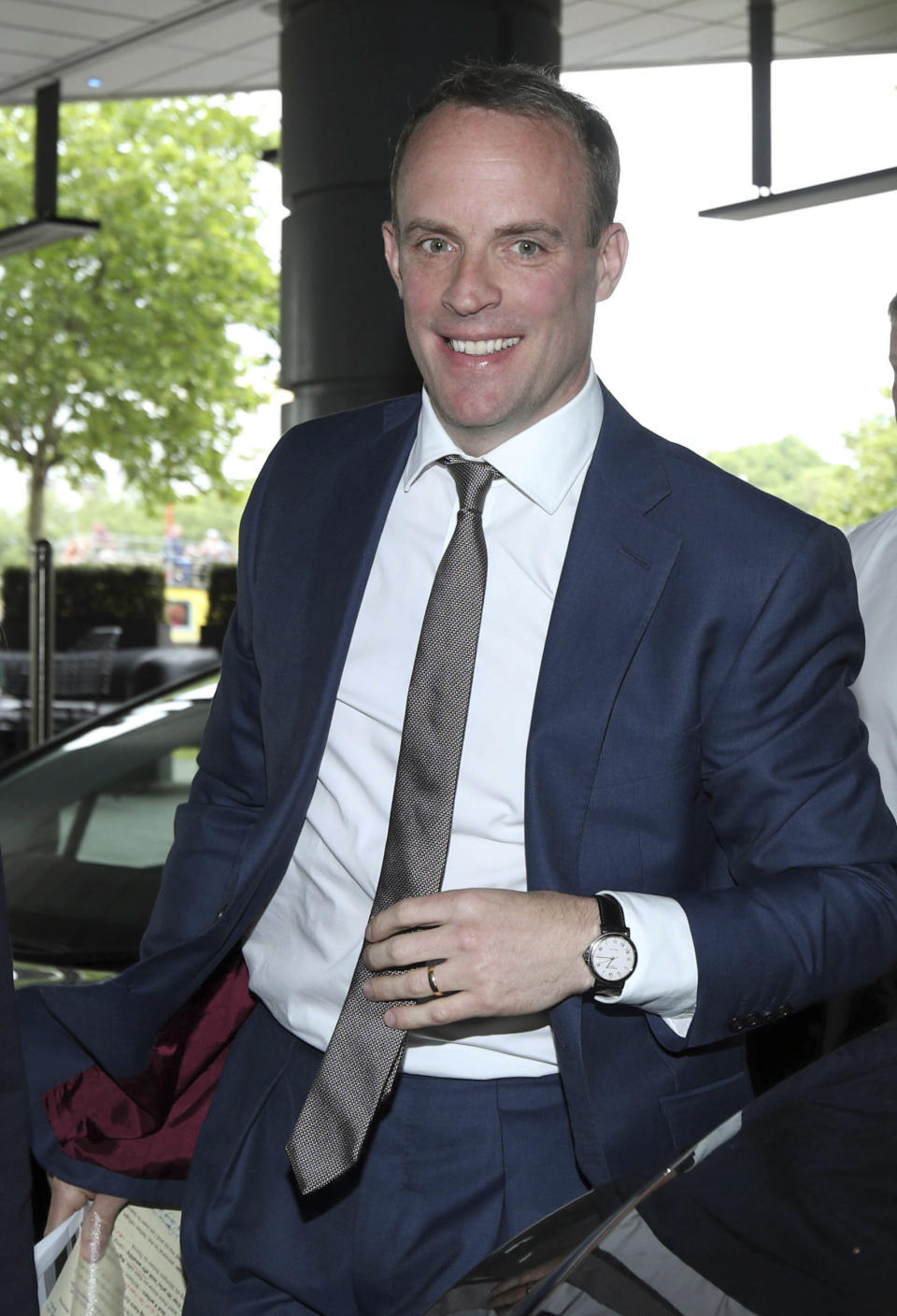 Conservative Party leadership contender Dominic Raab arrives for the Conservative National Convention meeting in central London, Saturday June 15, 2019. Britain's Conservative Party is holding elimination votes to reduce the field until the final two contenders will be put to a vote of 160,000 Conservative Party members nationwide, with the winner replacing Theresa May as party leader and prime minister, with the result due late July. (Yui Mok/PA via AP)