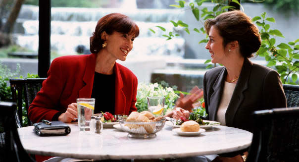 Two businesswomen having lunch