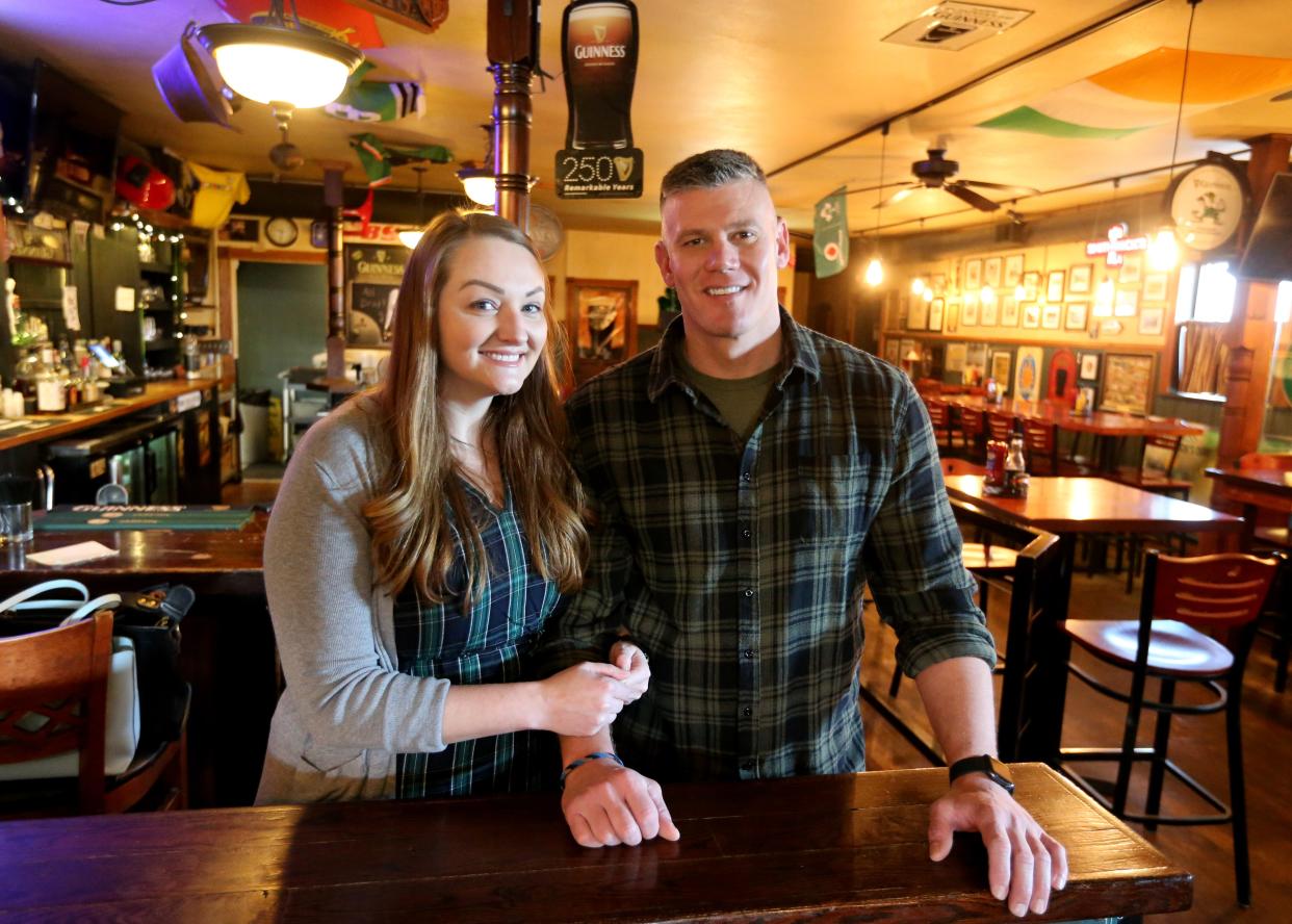 Amanda Budreau and Mike Aurenz, new co-owners, stand in the main dining area Thursday, March 28, 2024, at Kate O’Connor’s Irish Pub on East Michigan Street in New Carlisle.