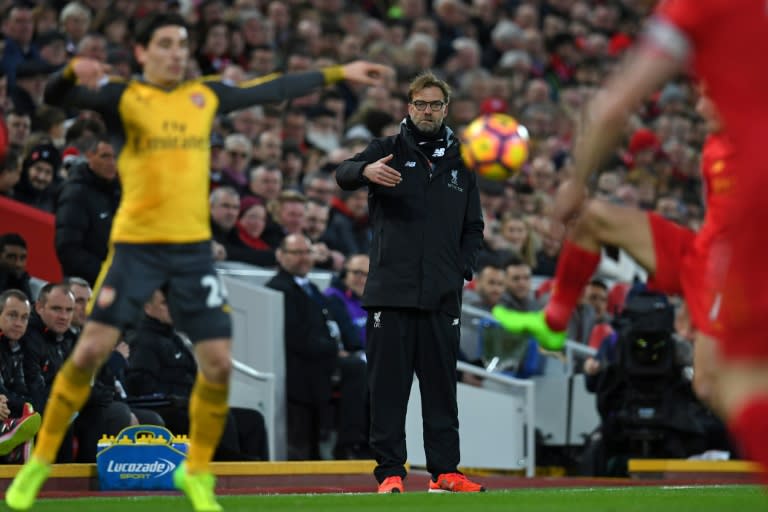 Liverpool's manager Jurgen Klopp watches from the touchline during the English Premier League football match against Arsenal March 4, 2017