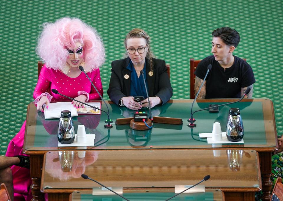 Brigitte Bandit, left, testifies against Senate Bills 12 and 1601, which would restrict drag performances, as Valerie DeBill and Kelsi Beaver wait to speak on March 23 in the Texas Senate chambers at the Capitol. Bandit's testimony went viral online.