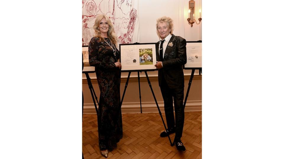 Penny and Rod Stewart with their pet portrait