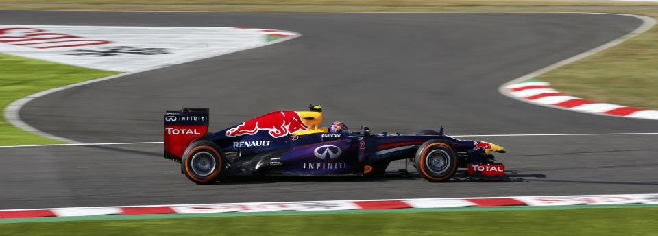 Red Bull Formula One driver Mark Webber of Australia drives during the qualifying session of the Japanese F1 Grand Prix at the Suzuka circuit October 12, 2013. REUTERS/Toru Hanai (JAPAN - Tags: SPORT MOTORSPORT F1)