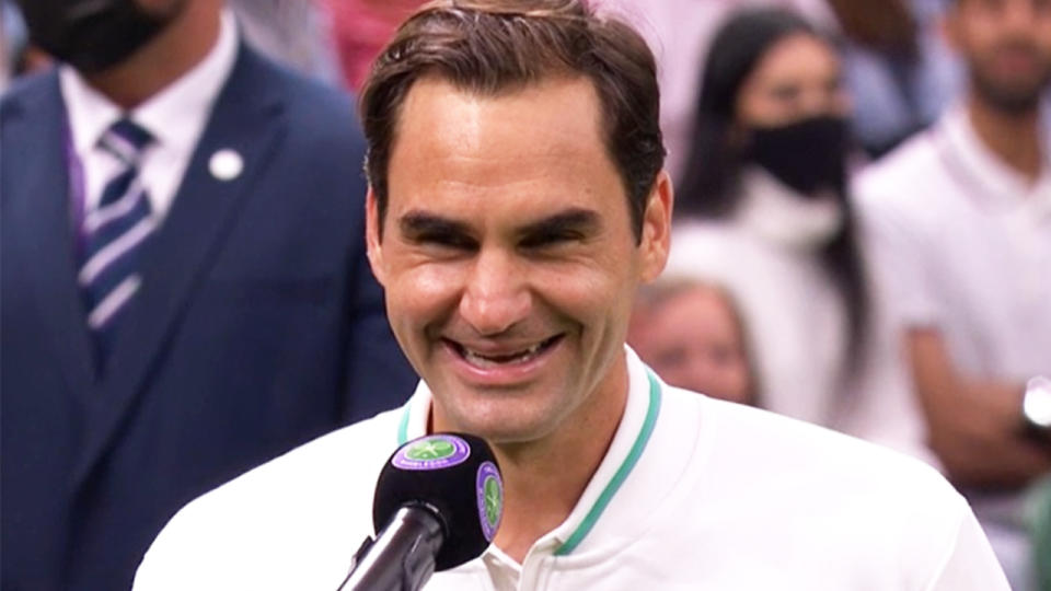 Roger Federer (pictured) laughs during an interview at Wimbledon.