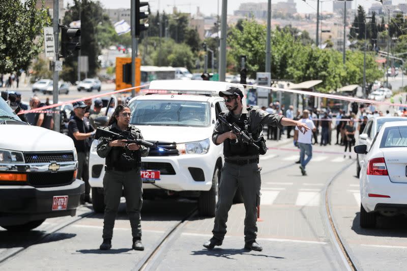 Israeli security forces stand guard at the scene of an incident in Jerusalem