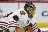 Chicago Blackhawks goaltender Marc-Andre Fleury stops the puck during the first period of the team's NHL hockey game against the Washington Capitals, Thursday, Dec. 2, 2021, in Washington. (AP Photo/Nick Wass)