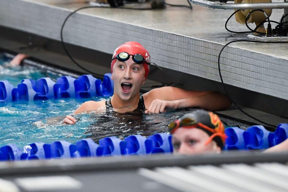 Fairport’s Kaleigh Lawrence reacts to her time in the final of the 50 yard freestyle during the NYSPHSAA Girls Swimming & Diving Championships, Saturday, Nov. 18, 2023.