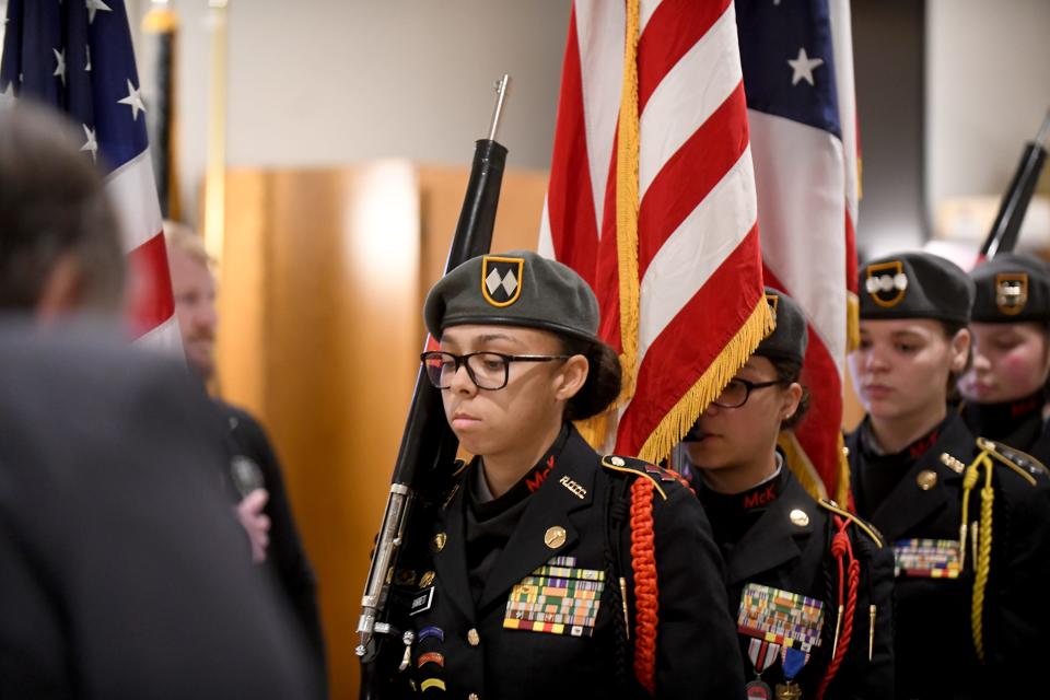 McKinley High School's Junior Army ROTC performs the honor guard presentation of Colors at the Greater Canton Veterans Service Council's Veterans Day ceremony on Friday at American Legion Post 44 in Canton.