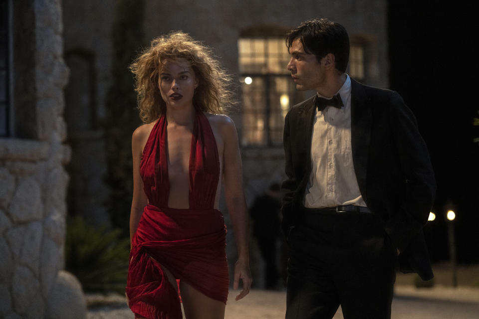 This image released by Paramount Pictures shows Margot Robbie, left, and Diego Calva in "Babylon." (Scott Garfield/Paramount Pictures via AP)