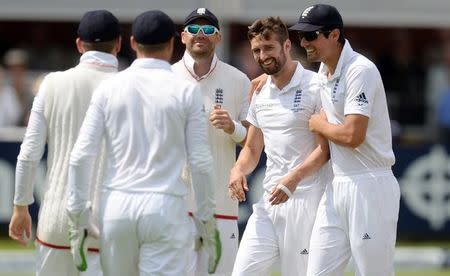 Cricket - England v Australia - Investec Ashes Test Series Second Test - Lord?s - 17/7/15 England's Mark Wood celebrates after he bowls and Gary Ballance catches out Australia's Michael Clarke Reuters / Philip Brown Livepic