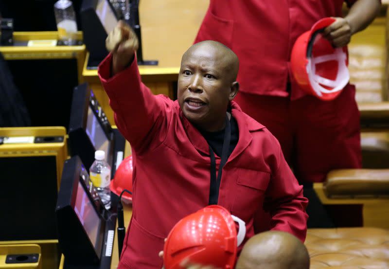 Opposition Economic Freedom Fighters party leader Julius Malema objects as South African President Cyril Ramaphosa attempts to deliver his State of the Nation address at parliament in Cape Town