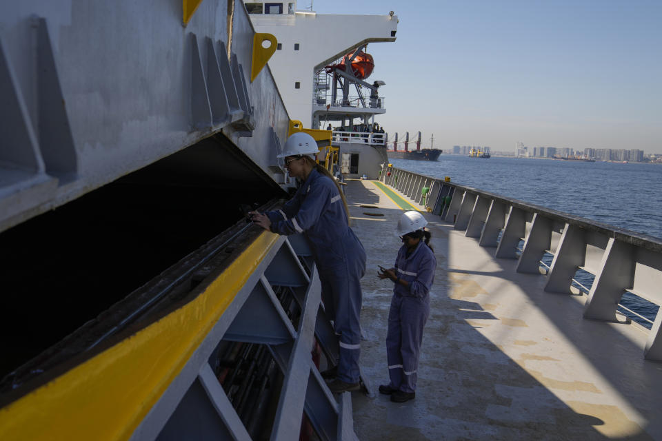 FILE - U.N. officials inspect the cargo ship Med Island, which came from Ukraine loaded with grain, while it is anchored in the Marmara Sea in Istanbul, Turkey, Saturday, Oct. 1, 2022. Recep Tayyip Erdogan, 69, takes the oath of office Saturday and starts his third presidential term after scoring another electoral victory last month. Already the longest-serving leader in the republic's history, Erdogan will now be stretching his rule into a third decade - until 2028 – and possibly even longer with the help of a friendly parliament. (AP Photo/Khalil Hamra, File)