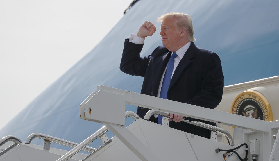 U.S. President Donald Trump gestures from Air Force One upon his arrival in Marietta, Georgia, U.S. November 8, 2019. REUTERS/Jonathan Ernst