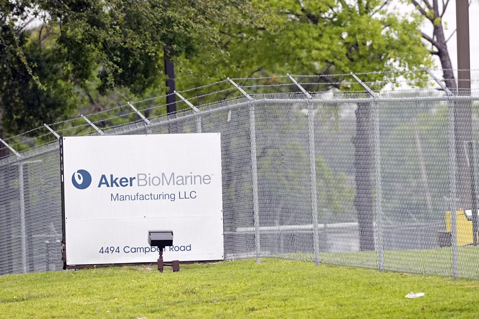 A sign stands in front of Aker BioMarine facilities in Houston on Wednesday, April 26, 2023. The Norwegian company is responsible for about 70% of the global krill catch by volume. It’s also driving innovation, having recently introduced continuous fishing with long, cylindrical nets attached to vacuums that have the capacity to suck up 1,200 metric tons of krill per day, although the company says its most advanced ship currently averages about 500 metric tons per day - the equivalent daily diet for about 150 humpback whales. (AP Photo/David J. Phillip)