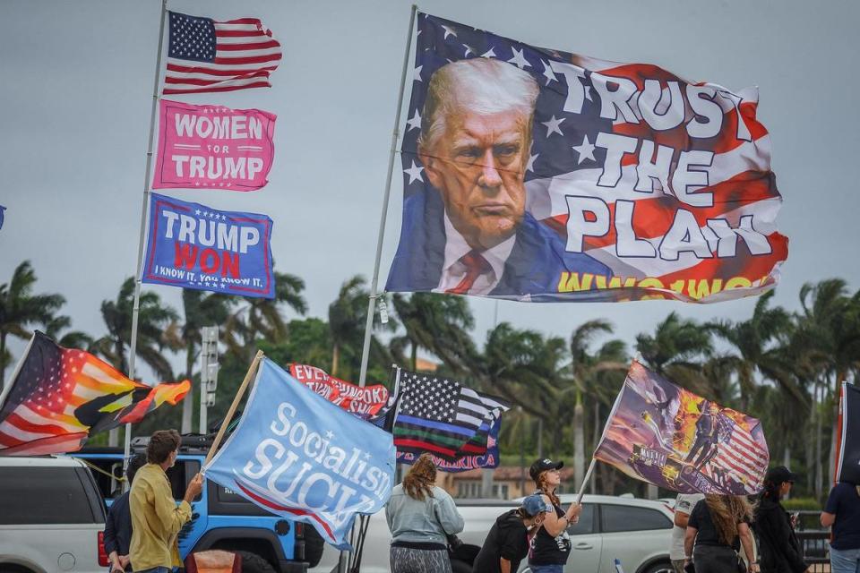 Enthusiastic fans of Donald Trump celebrate one of his many indictments.