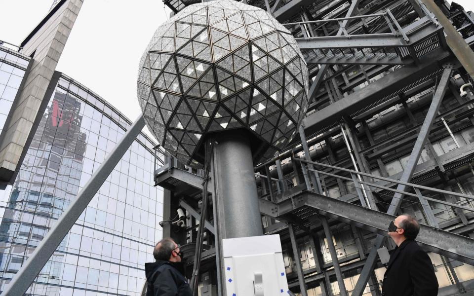 The world famous Times Square crystal ball drop will only be witnessed by 40 people in-person this year - ANGELA WEISS /AFP