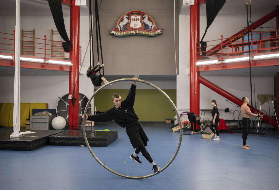 A group of young Ukrainian refugee circus students practicing in a training room in Budapest, Hungary, Monday, Feb. 13, 2023. More than 100 Ukrainian refugee circus students, between the ages of 5 and 20, found a home with the Capital Circus of Budapest after escaping the embattled cities of Kharkiv and Kyiv amid Russian bombings. (AP Photo/Denes Erdos)