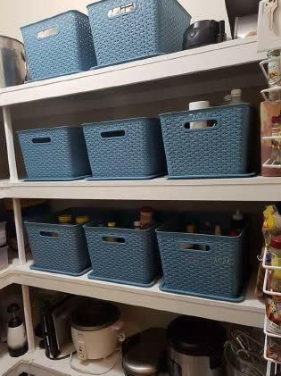 The mum-of-two showed off her before and after photos of her cupboard full of random tidbits before she bought baskets to make it all clean and tidy.  Photo: Belinda Hampson