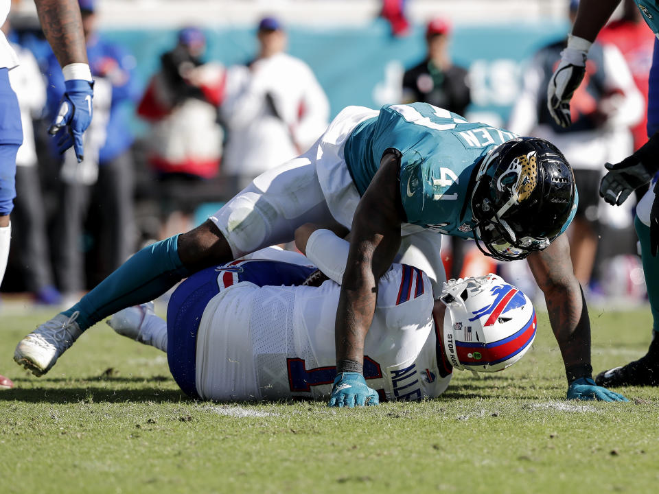 Linebacker Josh Allen of the Jacksonville Jaguars makes a sack on quarterback Josh Allen of the Buffalo Bills during the 2nd quarter of the game at TIAA Bank Field.