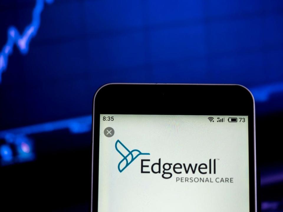 GettyImages 1124725723 UKRAINE - 2019/02/13: In this photo illustration, the Edgewell Personal Care consumer products company logo seen displayed on a smartphone. (Photo Illustration by Igor Golovniov/SOPA Images/LightRocket via Getty Images)