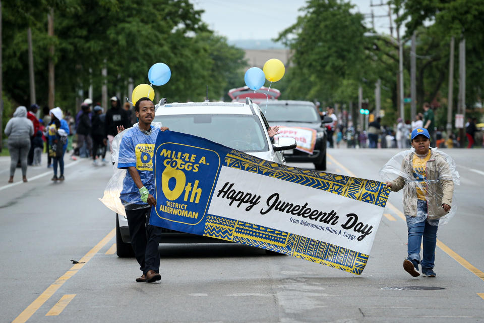 MILWAUKEE, WISCONSIN - JUNE 19:  Members of the parade perform during the 48th Annual Juneteenth Day Festival on June 19, 2019 in Milwaukee, Wisconsin. (Photo by Dylan Buell/Getty Images for VIBE)