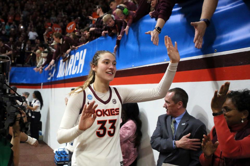 Virginia Tech's Elizabeth Kitley celebrates after the Hokies defeated South Dakota State in the second round of the NCAA women's basketball tournament.