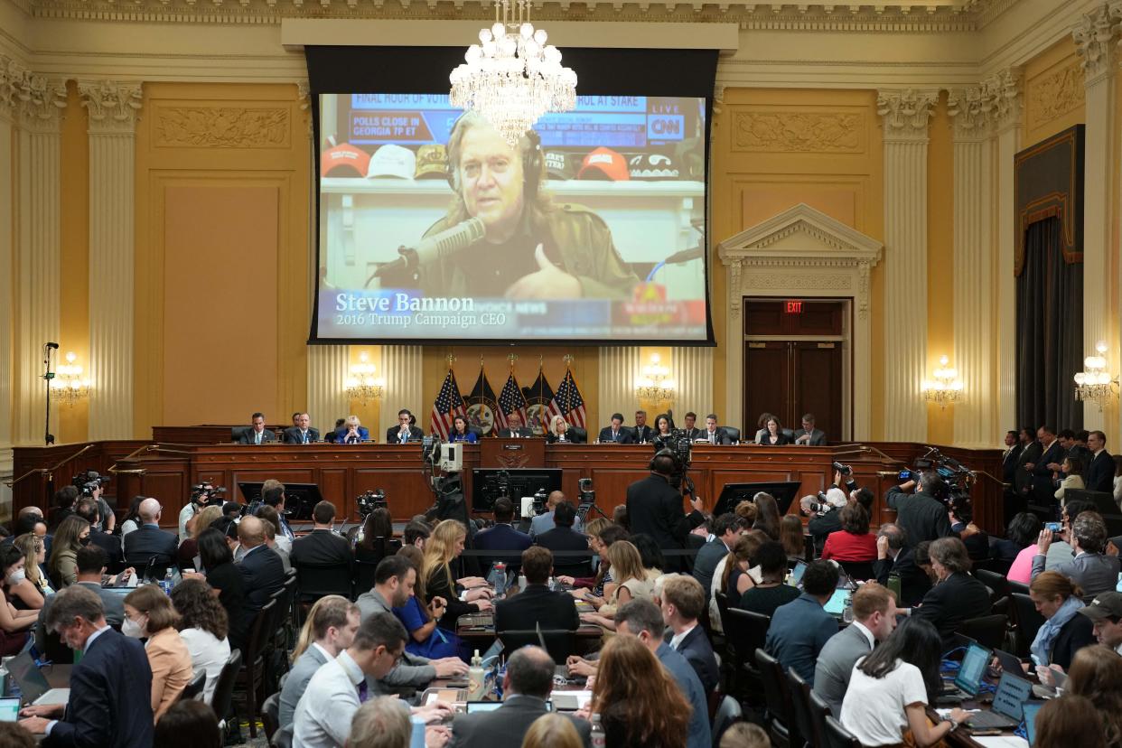 An image of Steve Bannon is displayed at the hearing.
