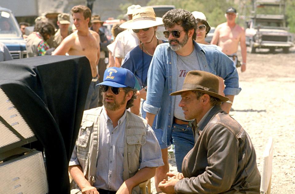 <p>Spielberg, Lucas, and Ford on the set of <em>Indiana Jones and The Last Crusade</em>.</p>