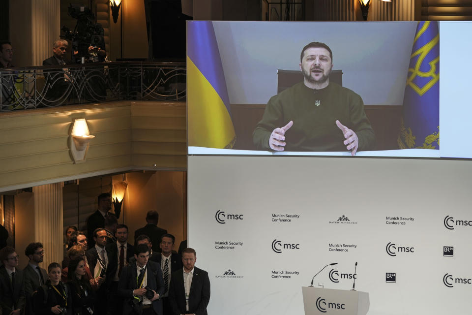 FILE - President Volodymyr Zelenskyy of Ukraine speaks from a screen at the Munich Security Conference in Munich, Germany, Friday, Feb. 17, 2023. Germany said Saturday, May 13, 2023, it is providing Ukraine with additional military aid worth more than 2.7 billion euros ($3 billion), including tanks, anti-aircraft systems and ammunition. The announcement Saturday came as preparations were underway in Berlin for a possible first visit to Germany by Ukrainian President Volodymyr Zelenskyy since Russia invaded his country last year. (AP Photo/Michael Probst, File)