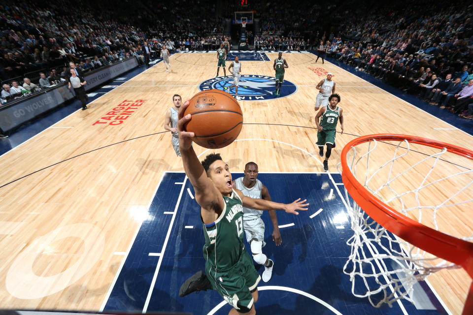 Malcolm Brogdon rises up for a finish early in the second quarter against the Timberwolves. He’d leave after this play. (Getty)