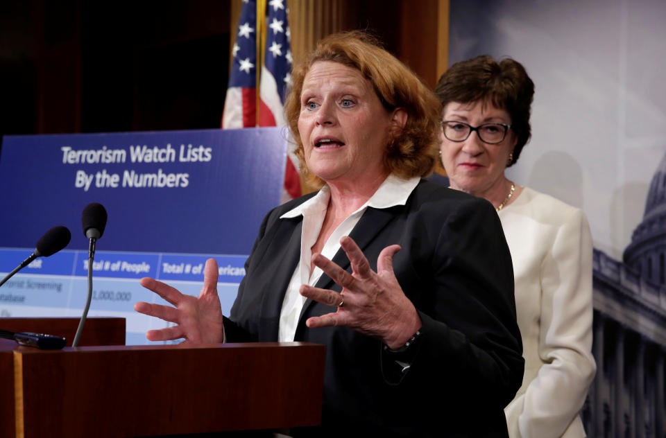 Senator Heidi Heitkamp (D-ND) speaks next to Sen. Susan Collins (R-ME) at a news conference with a bipartisan group of senators on Capitol Hill in Washington, D.C., U.S., to unveil a compromise proposal on gun control measures, June 21, 2016. REUTERS/Yuri Gripas