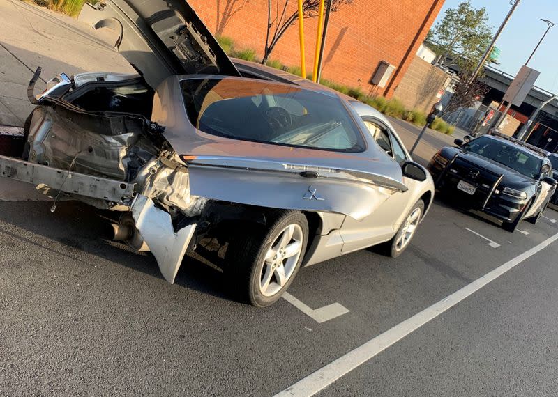 FILE PHOTO: A car lies damaged in an incident in Los Angeles