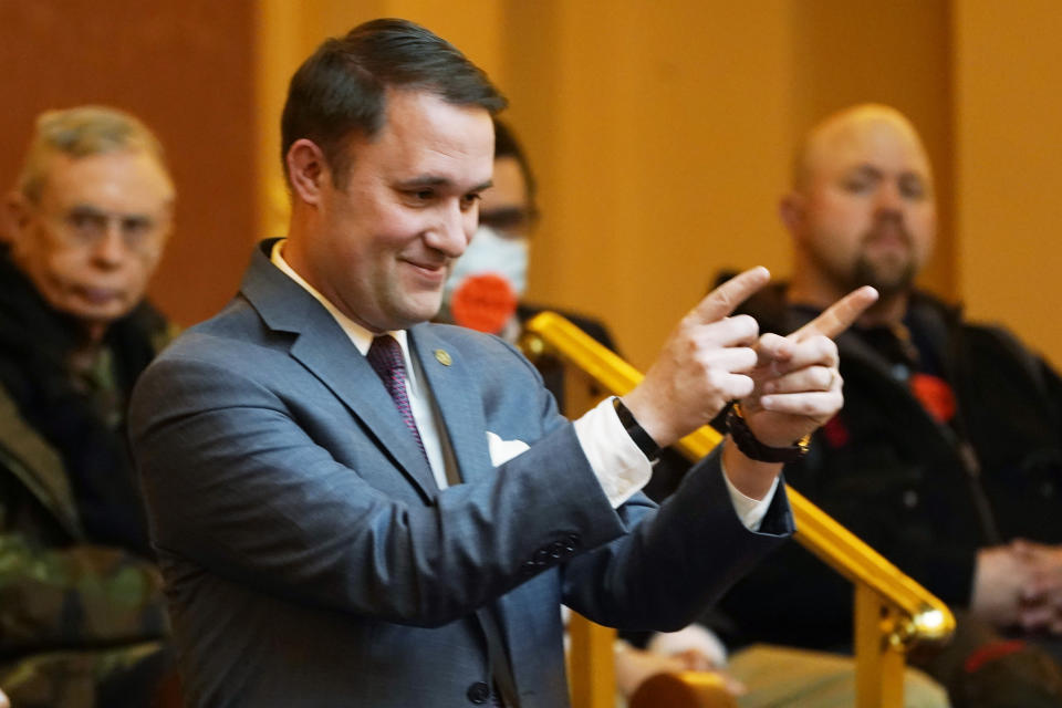 Virginia Attorney general Jason Miyares gestures as he is introduced in the Senate gallery at the Capitol Monday Jan. 17, 2022, in Richmond, Va. (AP Photo/Steve Helber)